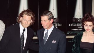 British actor Kenneth Branagh (L) stands with Britain's Prince Charles and British actress Helena Bonham Carter on November 1, 1994 at Los Angeles during the world premiere of "Mary Shelley's Frankenstein". The Prince of Wales is visiting Los Angeles for the first time in 17 years. traitement cc (Photo by Vince BUCCI / AFP)