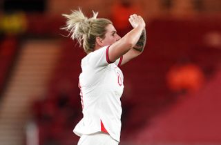 Millie Bright celebrates scoring against Canada