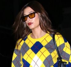 Hailey Bieber attends church in a yellow argyle sweater February 2024