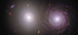 An elliptical galaxy (left) and a spiral galaxy (right).