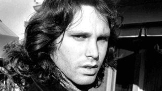 Jim Morrison of The Doors posing for a photograph in 1967