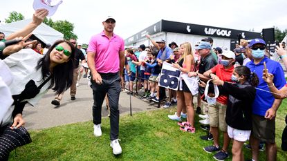 Brooks Koepka walks to the practice area during the second LIV Golf Invitational Series tournament at Portland