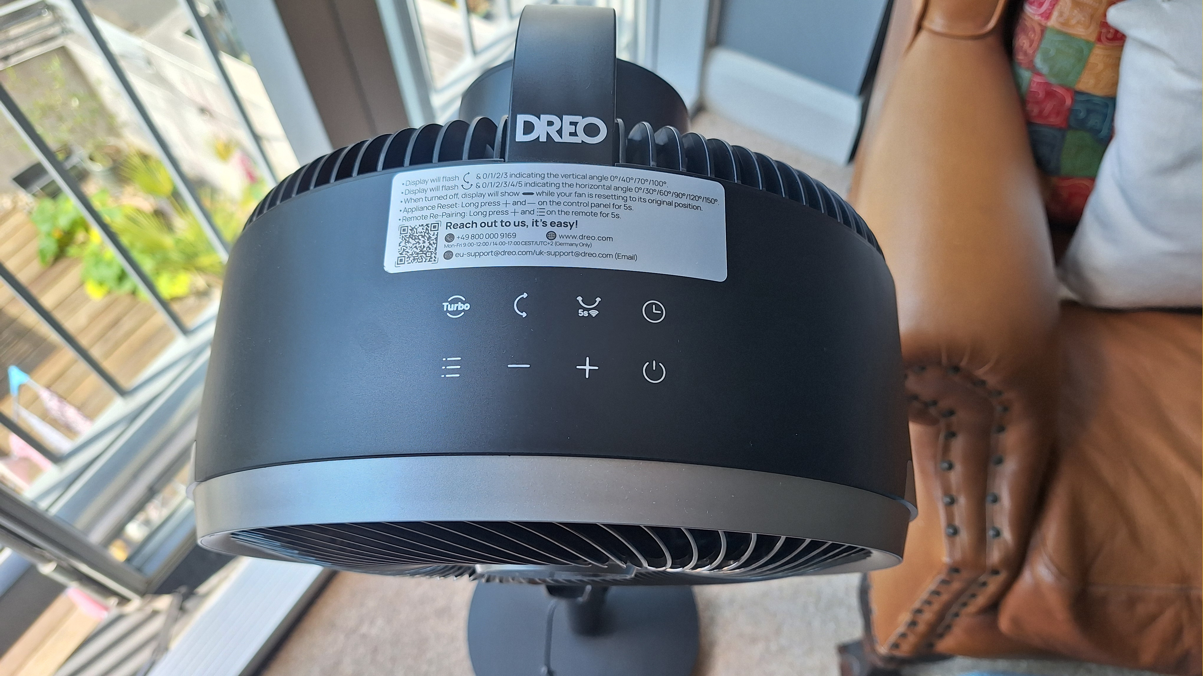 Close up of touchscreen buttons on top of Dreo fan head