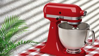 red stand or kitchen mixer on table