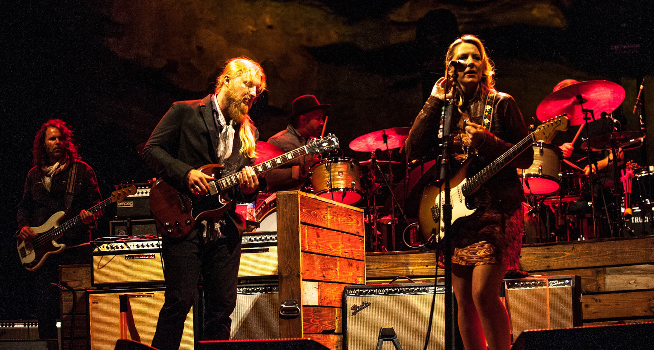 Tedeschi Trucks Band live onstage at Red Rocks, Colorado, in 2015, with Derek Trucks playing his Gibson SG, and frontwoman Susan Tedeschi with a Strat.