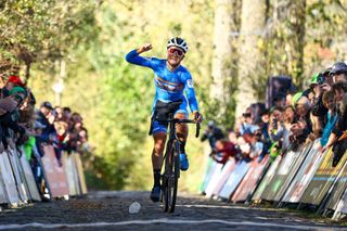US rider Andrew August celebrates as he crosses the finish line to win the junior men's race Koppenbergcross, the first race of eight of the X2O Badkamers trophy, in Melden on November 1, 2022.