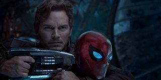 Star-Lord holding blaster to Spider-Man's head in Avengers: Infinity War