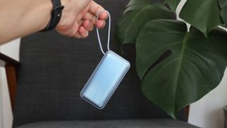 Anker Nano 30W Power Bank held by its carry handle