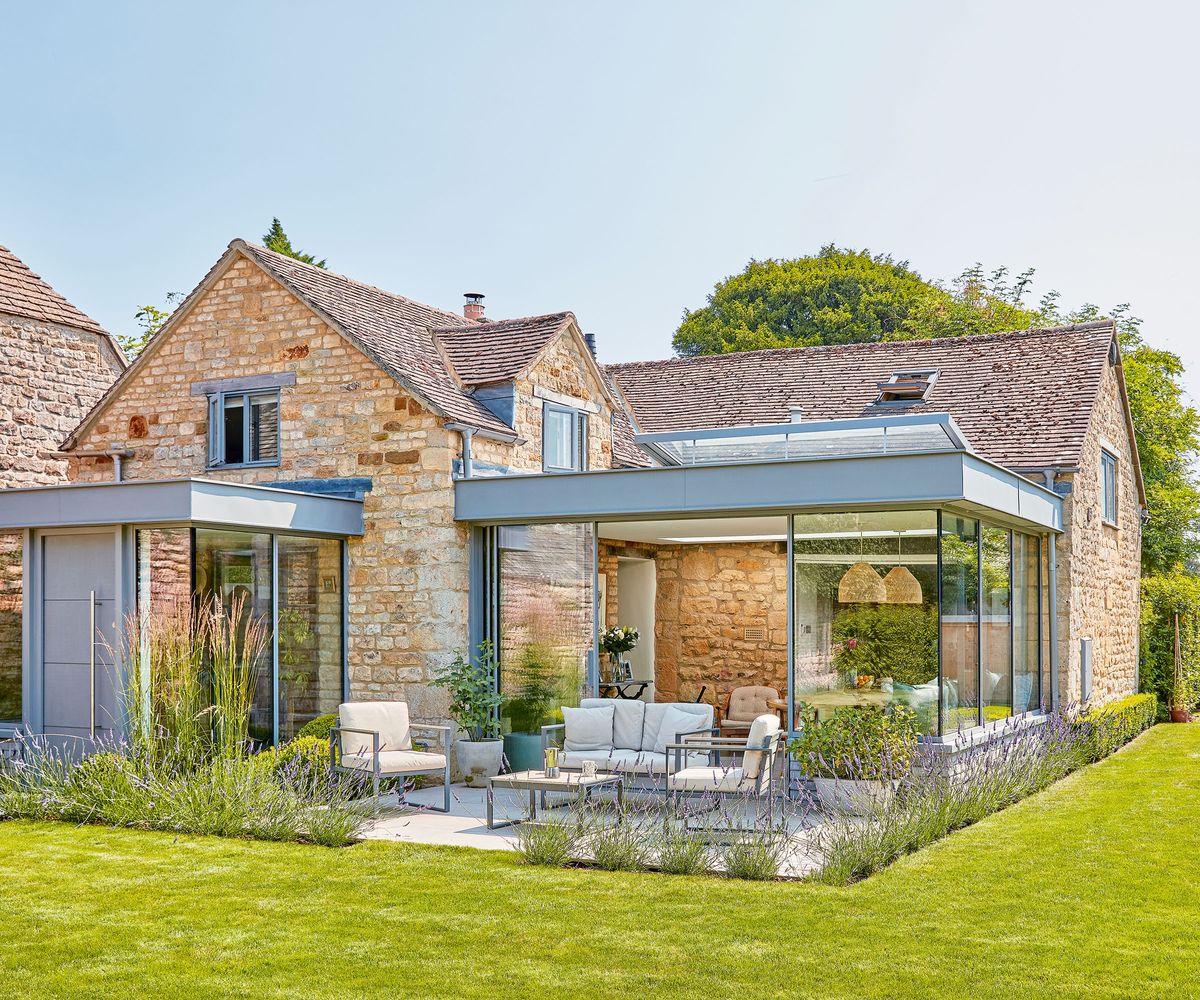 A stone cottage with glass box extension to extend the ground floor as well as link the cottage areas more effectively