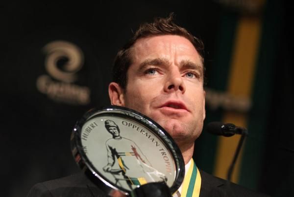Evans holds his trophy for cyclist of the year