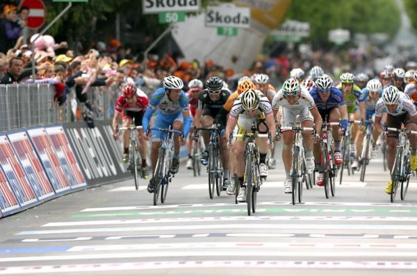Desperation on the faces of Goss' rivals as the HTC-Columbia rider closes on the finish line