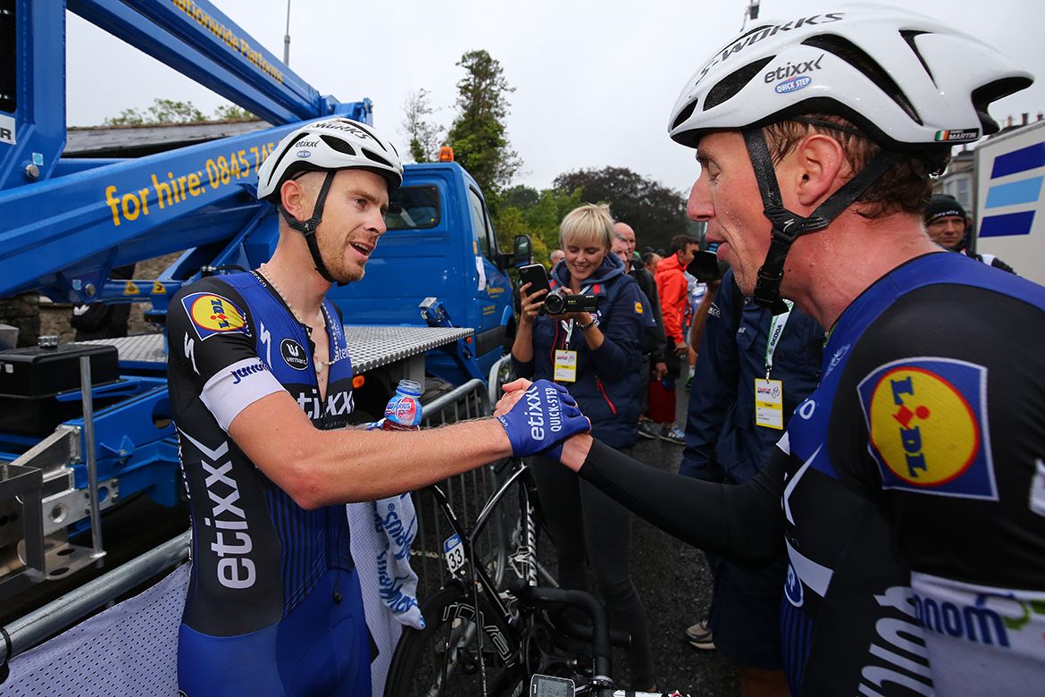 Julien Vermote accepts the congratulations of Etixx-QuickStep comrade Dan Martin.