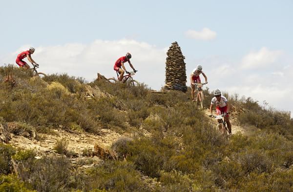Stage winners Christoph Sauser and Burry Stander of Songo Specialized by DCM are followed by Silvio Bundi and Thomas Zahnd of DCM1