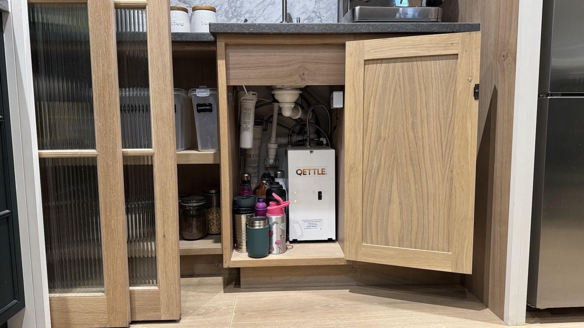 boiling water tap tank in oak cupboard