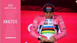 Remco Evenepoel (Soudal-QuickStep) zips on the maglia rosa after stage 9 of the Giro d'Italia though will not get to line up in it on stage 10