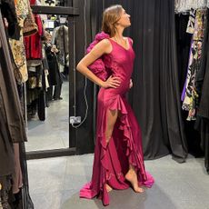 Camille Charriere wearing a fuchsia colored gown.