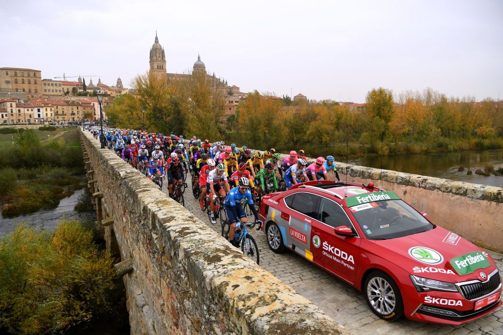 CIUDADRODRIGO SPAIN NOVEMBER 06 Start Primoz Roglic of Slovenia and Team Jumbo Visma Red Leader Jersey Richard Carapaz of Ecuador and Team INEOS Grenadiers Green Points Jersey Christopher Froome of The United Kingdom and Team INEOS Grenadiers Mitchell Docker of Australia and Team EF Pro Cycling Salamanca City Peloton Bridge Landscape during the 75th Tour of Spain 2020 Stage 16 a 162km stage from Salamanca to Ciudad Rodrigo lavuelta LaVuelta20 La Vuelta on November 06 2020 in Ciudad Rodrigo Spain Photo by David RamosGetty Images