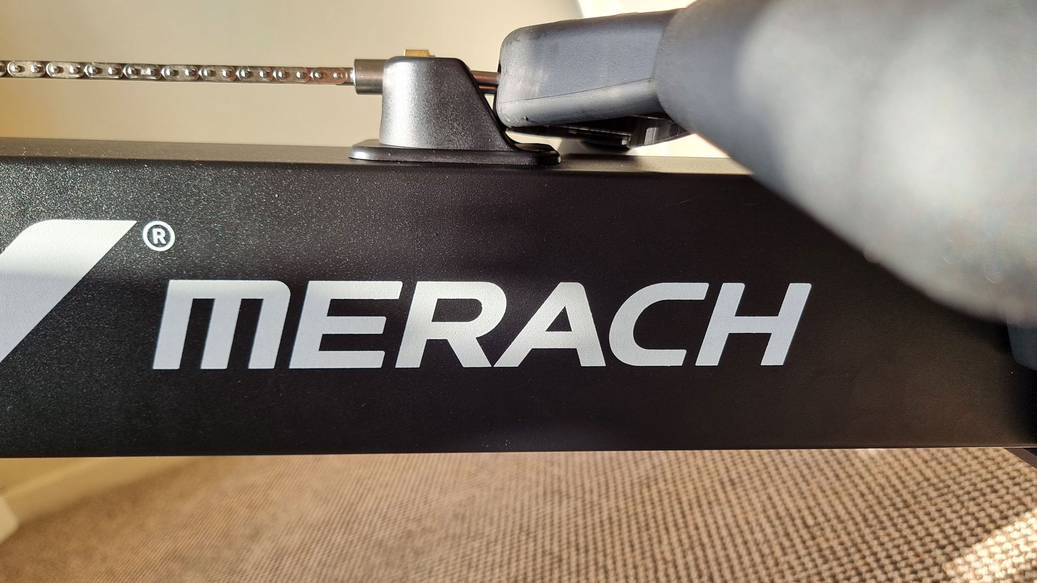A close up of the Merach logo on the NovaRow R50.