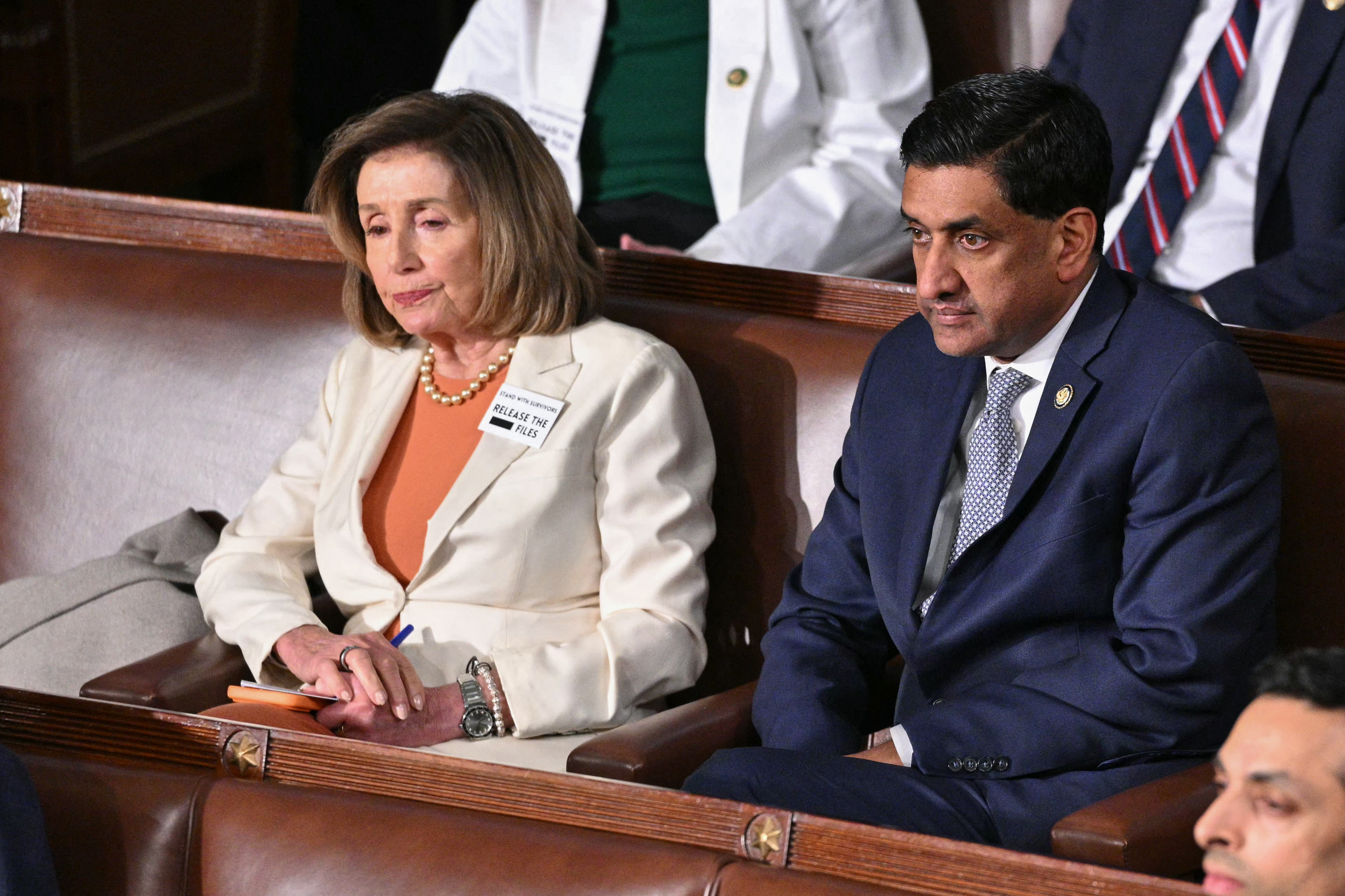 Nancy Pelosi wearing a white suit at the 2026 state of the union
