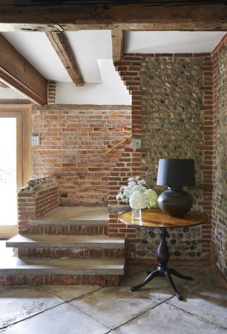 brick staircase in flint-and-brick house