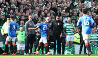 Alfredo Morelos leaves the pitch after being sent off against Celtic