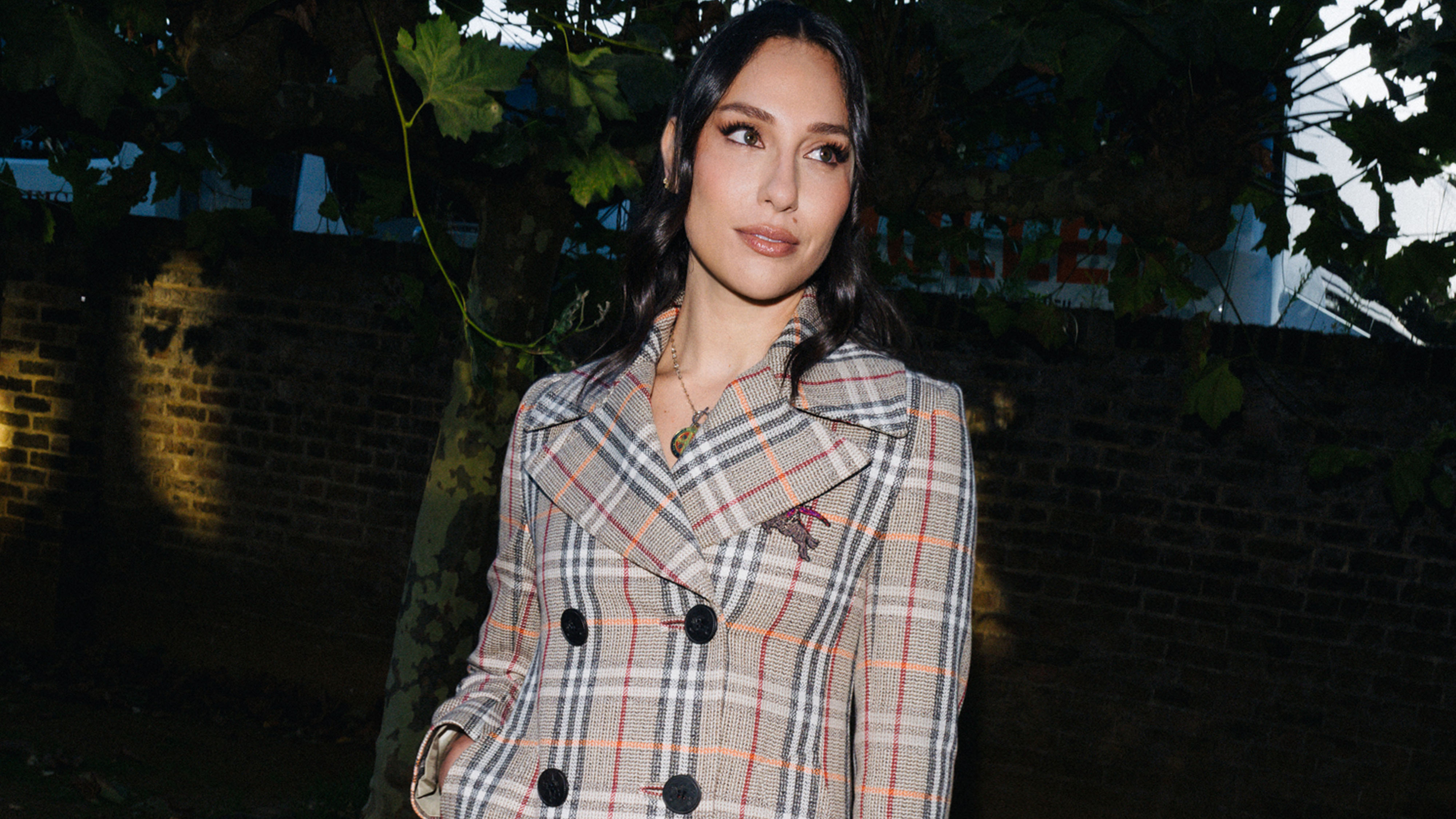 Tefi Pessoa getting ready to attend the Burberry Spring 2026 runway show