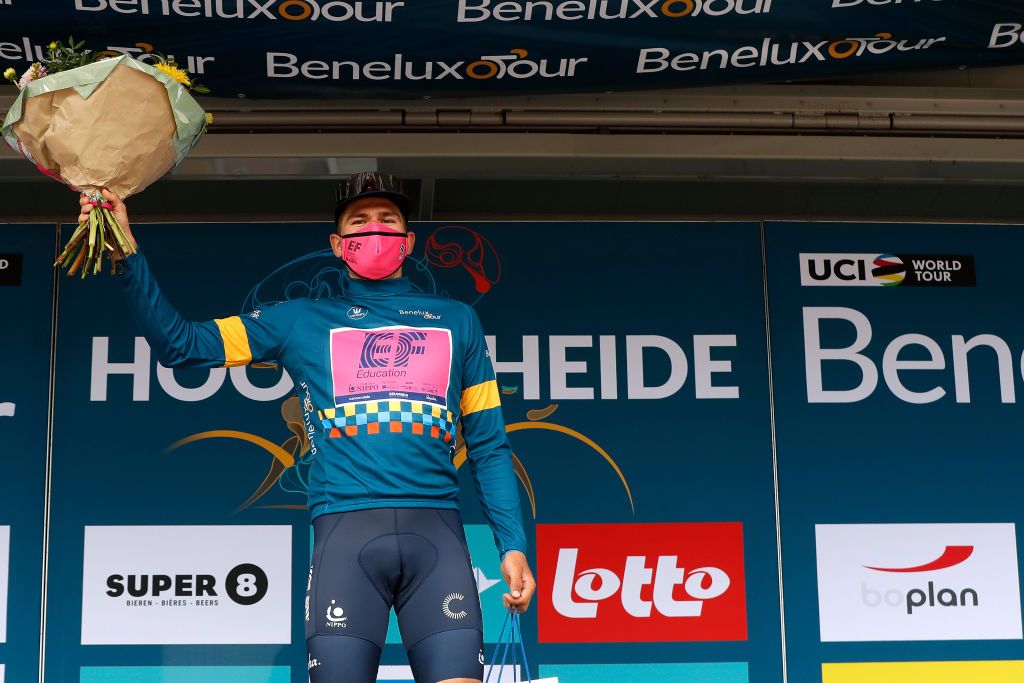 HOOGERHEIDE NETHERLANDS SEPTEMBER 01 Stefan Bissegger of Switzerland and Team EF Education Nippo celebrates winning the Blue Leader Jersey on the podium ceremony after the 17th Benelux Tour 2021 Stage 3 a 1683km stage from Essen to Hoogerheide BeneluxTour on September 01 2021 in Hoogerheide Netherlands Photo by Bas CzerwinskiGetty Images