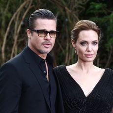 Angelina Jolie and Brad Pitt attend a private reception for costumes and props from Disney's "Maleficent"