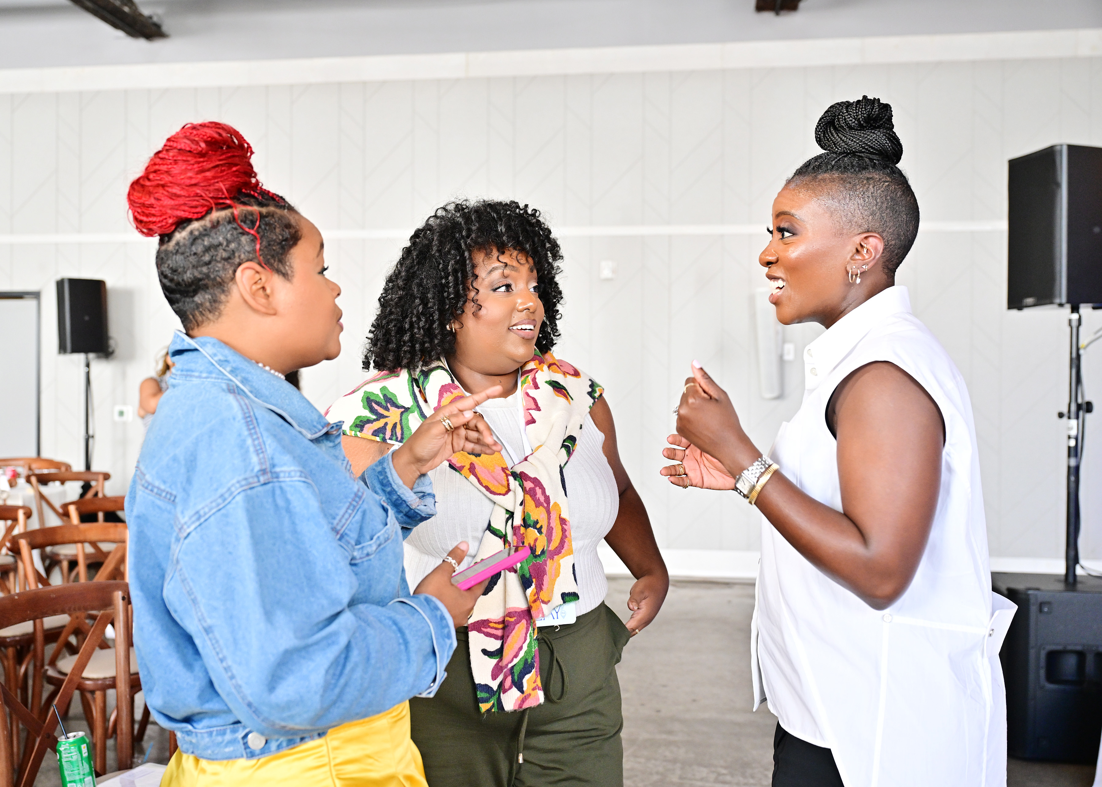 Nikki Ogunnaike chatting with two guests in between sessions at Marie Claire&amp;rsquo;s Power Play summit.
