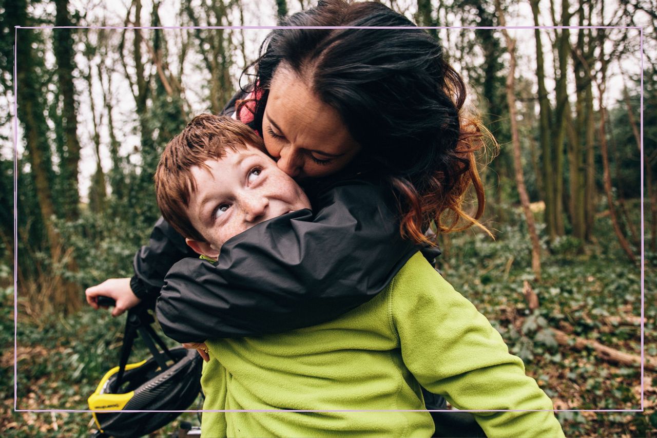 Mum hugging her 8-year-old son