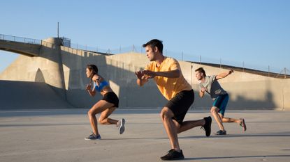 Exercise group performing ice skaters