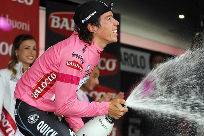 Rigoberto Uran (Omega Pharma-Quickstep) celebrates his first day of wearing the leader's jersey at the Giro d'Italia