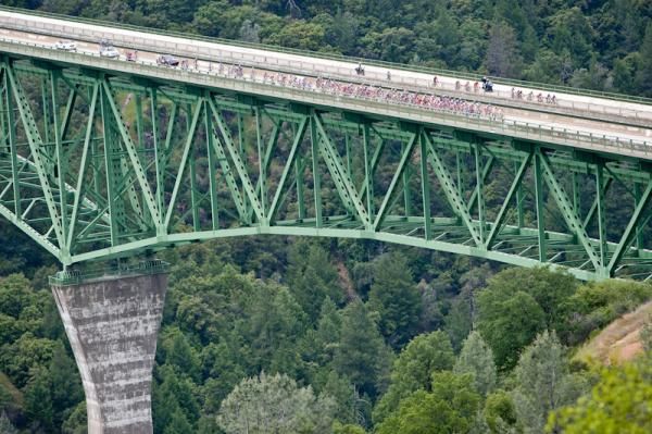 Riders cross a massive bridge across a deep gorge just outside of Andersonville.