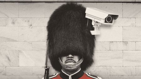 Royal Guard with a CCTV camera emerging from his bearskin hat