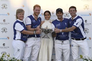 Dana Barnes, Prince Harry, Duke of Sussex, Meghan, Duchess of Sussex, Adolfo Cambiaso and Malcolm Borwick during the Royal Salute Polo Challenge benefitting Sentebale at Grand Champions Polo Club on April 12, 2024 in Wellington, Florida.