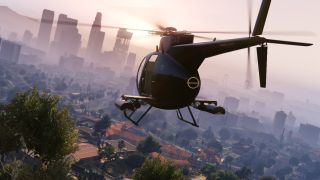 A helicopter flies towards the city of Los Santos with the sun setting