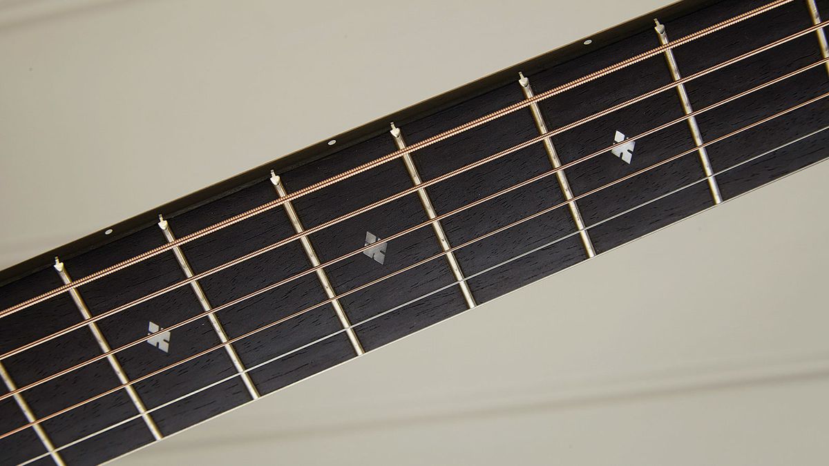 With subtle bling from the small diamond inlays, the playability here is typically Taylor: superb!