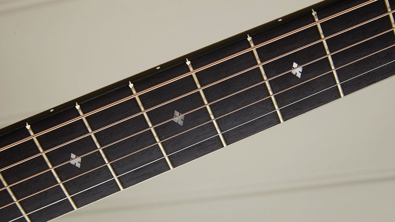 With subtle bling from the small diamond inlays, the playability here is typically Taylor: superb!