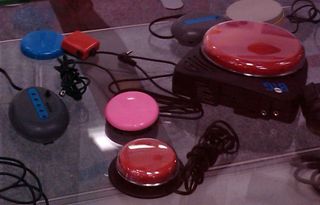 Various switch input devices, plastic buttons in various sizes and colours