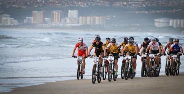 Riding on a stretch of the beach at the start