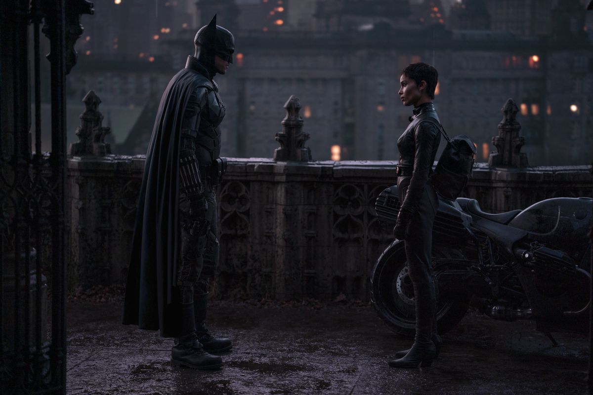 ROBERT PATTINSON as Batman and ZO&Euml; KRAVITZ as Selina Kyle in The Batman