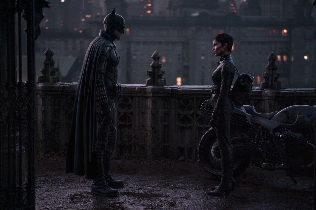 ROBERT PATTINSON as Batman and ZO&Euml; KRAVITZ as Selina Kyle in The Batman