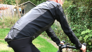 Image shows a rider wearing the Castelli Idro Pro 3 Jacket.