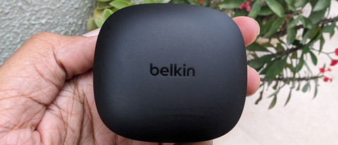 Belkin SoudForm Pulse wireless earbuds held in hand