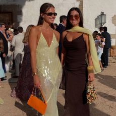 Women in wedding guest dresses