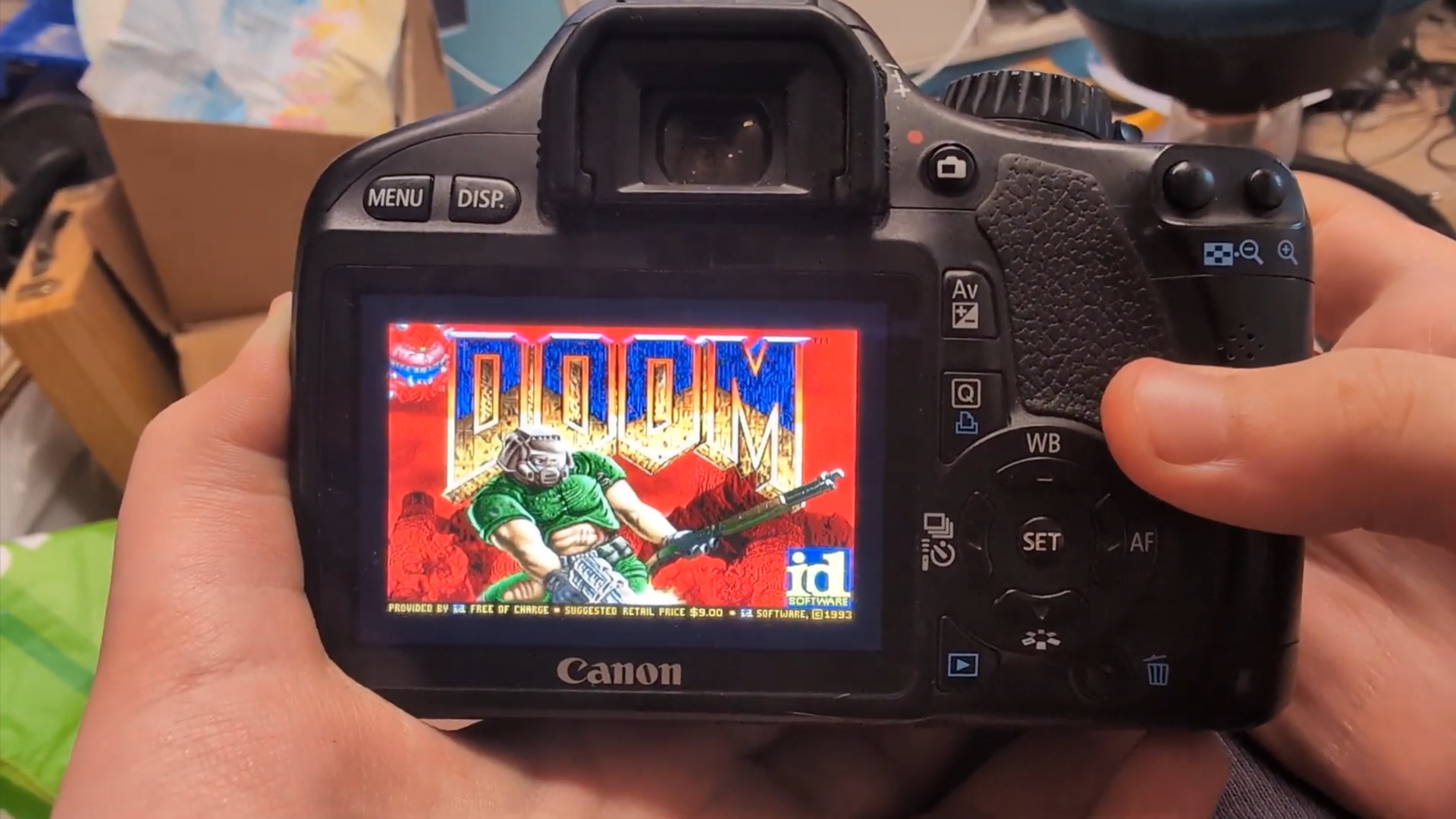 a Canon EOS 550D running Doom on its 3.2-inch LCD screen
