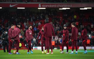 Liverpool players warm up