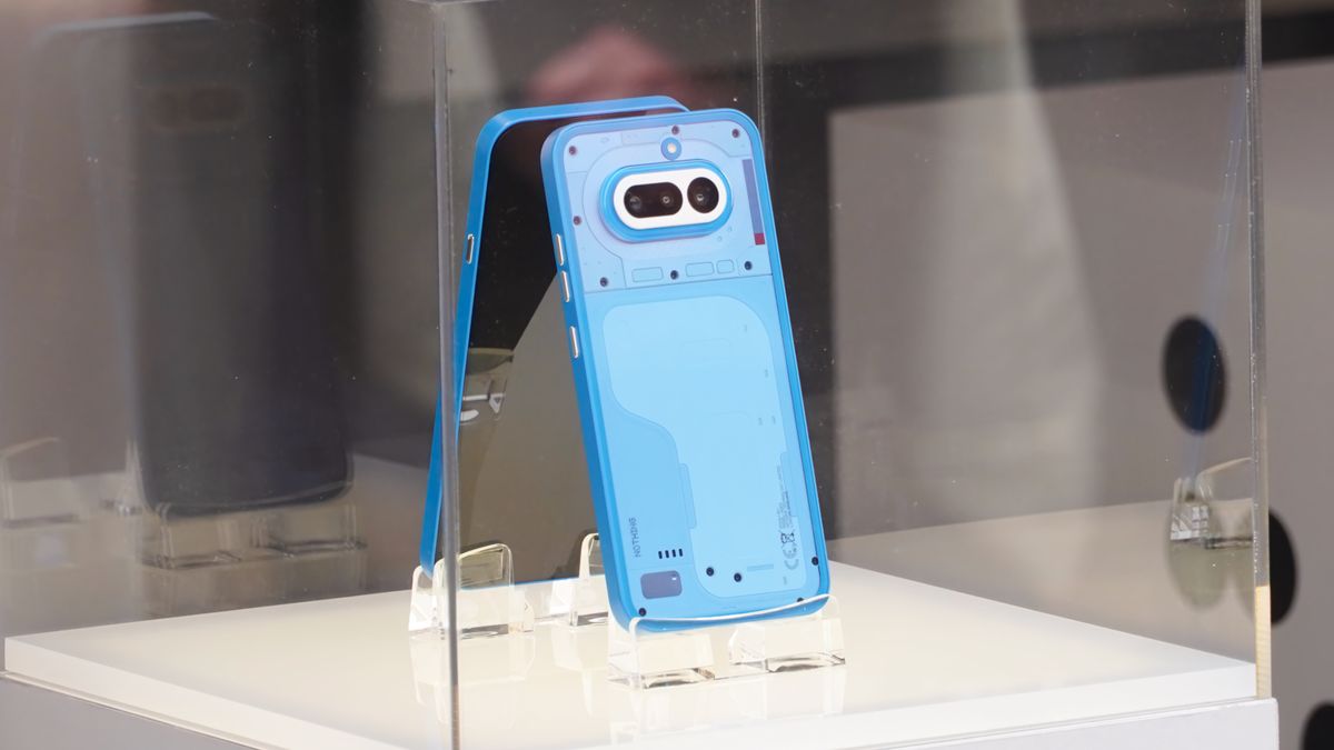 The Nothing Phone 4a on display at MWC 2026 in Black, White, Blue, and Pink colorways.