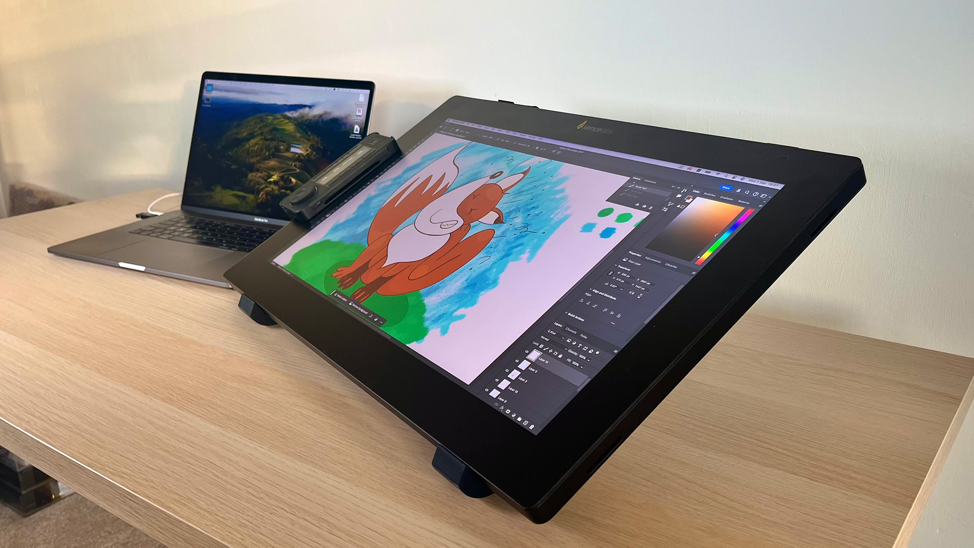 Xencelabs Pen Display 24+ in a flatter tilted position with cartoon fox on screen