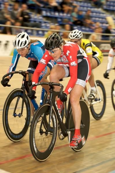 Anna Lang (B&amp;L Bikes) leads Cari Higgins (Pro Man) with one lap to go in the Keirin heats.